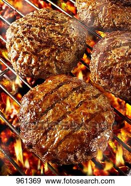 Stock Photograph - burgers on barbecue 
rack. fotosearch 
- search stock 
photos, pictures, 
images, and photo 
clipart