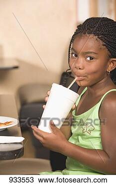 Stock Photo - girl in restaurant 
drinking a soft 
drink. fotosearch 
- search stock 
photos, pictures, 
images, and photo 
clipart