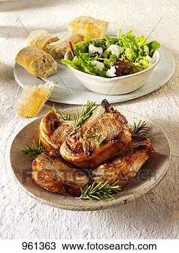 Stock Photo - grilled pork chops 
with rosemary, 
salad leaves and 
bread. fotosearch 
- search stock 
photos, pictures, 
images, and photo 
clipart