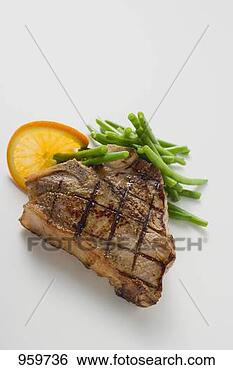 Stock Photo - grilled t-bone 
steak with french 
beans. fotosearch 
- search stock 
photos, pictures, 
images, and photo 
clipart