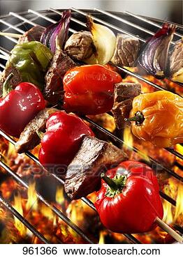Stock Photo - meat and pepper 
kebabs on barbecue. 
fotosearch - search 
stock photos, 
pictures, images, 
and photo clipart