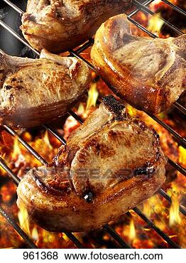 Stock Photo - pork chops on 
barbecue rack. 
fotosearch - search 
stock photos, 
pictures, images, 
and photo clipart