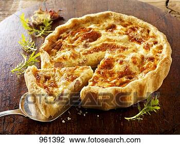 Stock Photo - quiche lorraine, 
a slice cut. fotosearch 
- search stock 
photos, pictures, 
images, and photo 
clipart