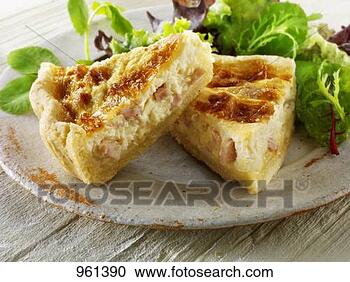 Stock Photography - two pieces of 
quiche lorraine 
with salad leaves. 
fotosearch - search 
stock photos, 
pictures, images, 
and photo clipart