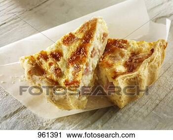 Stock Photography - two slices of 
quiche lorraine 
on paper. fotosearch 
- search stock 
photos, pictures, 
images, and photo 
clipart