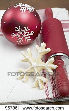 Stock Photography - christmas biscuit, 
rolling pin and 
christmas bauble. 
fotosearch - search 
stock photos, 
pictures, images, 
and photo clipart
