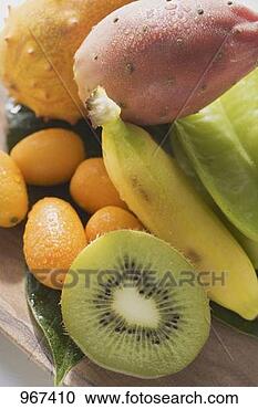 Stock Photography - exotic fruit still 
life with kiwi 
fruit, kumquats, 
banana. fotosearch 
- search stock 
photos, pictures, 
images, and photo 
clipart