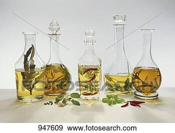 Stock Photograph - five different 
flavoured vinegars. 
fotosearch - search 
stock photos, 
pictures, images, 
and photo clipart