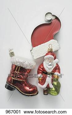 Stock Photography - sweet father christmas 
hat and christmas 
tree ornaments. 
fotosearch - search 
stock photos, 
pictures, images, 
and photo clipart