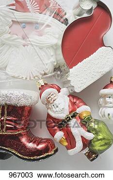 Stock Photo - sweet father christmas 
hat, christmas 
tree ornaments 
& biscuit. fotosearch 
- search stock 
photos, pictures, 
images, and photo 
clipart