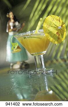 Stock Photo - tropical rum cocktail 
in a glass with 
cocktail umbrella. 
fotosearch - search 
stock photos, 
pictures, images, 
and photo clipart