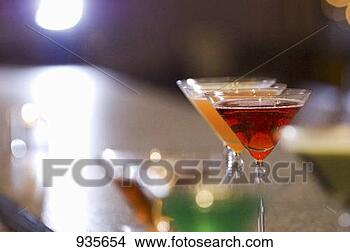 Stock Photo - various martinis 
on a bar. fotosearch 
- search stock 
photos, pictures, 
images, and photo 
clipart