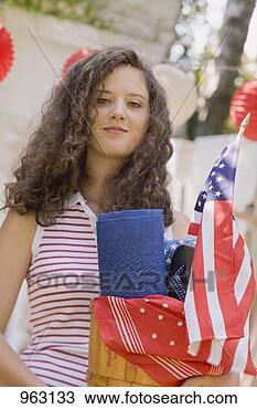Stock Photo - young woman at 
a 4th of july 
garden party (usa). 
fotosearch - search 
stock photos, 
pictures, images, 
and photo clipart
