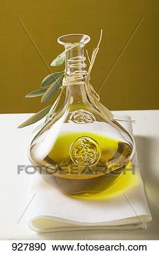 Stock Photography - olive oil in carafe 
with olive branch. 
fotosearch - search 
stock photos, 
pictures, images, 
and photo clipart