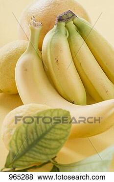 Stock Photo - bananas and citrus 
fruit. fotosearch 
- search stock 
photos, pictures, 
images, and photo 
clipart