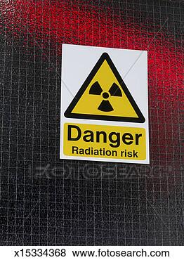Stock Photo - 'danger radiation 
risk' sign on 
door, close-up. 
fotosearch - search 
stock photos, 
pictures, images, 
and photo clipart