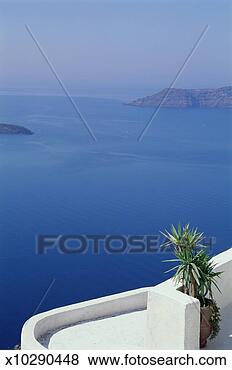 Stock Photo - greece, cyclades 
islands, santorini, 
view from balcony. 
fotosearch - search 
stock photos, 
pictures, images, 
and photo clipart