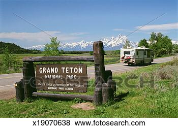 Stock Photo - usa, grand teton 
national park 
entrance, motor 
home in background. 
fotosearch - search 
stock photos, 
pictures, images, 
and photo clipart