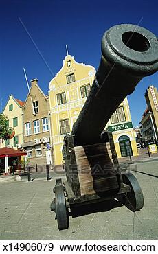 Stock Photograph - curacao, willemstad, 
handelskade, cannon 
in front of dutch 
buildings. fotosearch 
- search stock 
photos, pictures, 
images, and photo 
clipart
