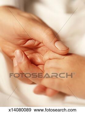 Stock Photograph - father holding 
daughter's (3-5) 
hand, close-up 
of hands. fotosearch 
- search stock 
photos, pictures, 
images, and photo 
clipart