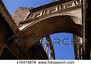 Stock Photo - spain, valencia, 
archway between 
valencia cathedral 
and bell tower. 
fotosearch - search 
stock photos, 
pictures, images, 
and photo clipart
