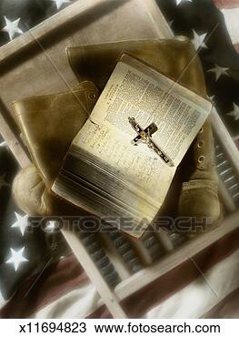 Stock Photo - bible with crucifix 
on old boots, 
washboard, and 
us flag (tinted 
b&w). fotosearch 
- search stock 
photos, pictures, 
images, and photo 
clipart