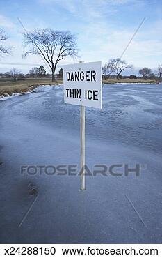 Stock Photography - danger thin ice 
sign on frozen 
water, winter. 
fotosearch - search 
stock photos, 
pictures, images, 
and photo clipart