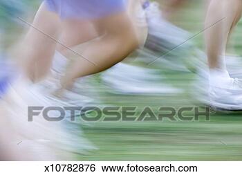 Stock Photo - people competing 
in cross country 
race, low section 
(blurred motion). 
fotosearch - search 
stock photos, 
pictures, images, 
and photo clipart