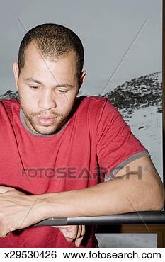 Stock Photo - man lifting weights 
in gym, upper 
half. fotosearch 
- search stock 
photos, pictures, 
images, and photo 
clipart