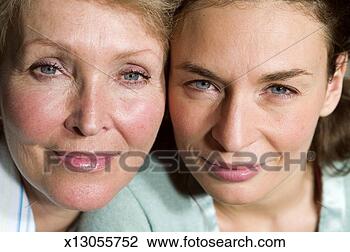 Stock Photo - mature mother 
and daughter face 
to face, close 
up, portrait. 
fotosearch - search 
stock photos, 
pictures, images, 
and photo clipart