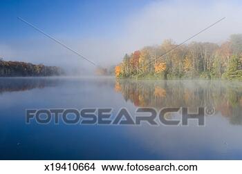 Stock Photo - usa, north carolina, 
blue ridge parkway, 
morning fog on 
price lake. fotosearch 
- search stock 
photos, pictures, 
images, and photo 
clipart