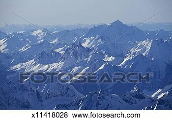 Stock Photo - usa,  washington 
state,  snow covered 
north cascade 
mountains. fotosearch 
- search stock 
photos, pictures, 
images, and photo 
clipart