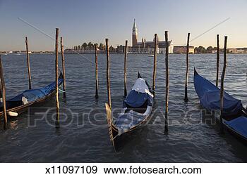 Stock Photograph - italy,  venice, 
 moored gondolas, 
 island of san 
giorgio maggiore 
in. fotosearch 
- search stock 
photos, pictures, 
images, and photo 
clipart