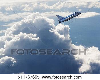Stock Image - fighter plane 
in flight above 
clouds, side view. 
fotosearch - search 
stock photos, 
pictures, images, 
and photo clipart