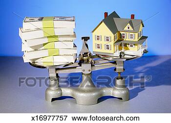 Picture - old fashioned 
balance scale 
with stack of 
money and model 
of house. fotosearch 
- search stock 
photos, pictures, 
images, and photo 
clipart
