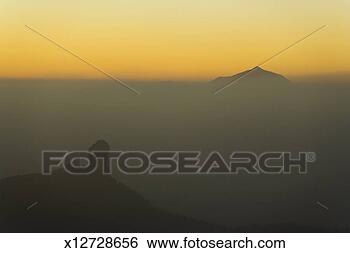 Stock Photo - spain, canary 
islands, gran 
canaria, teneriffe 
in distance, sunset. 
fotosearch - search 
stock photos, 
pictures, images, 
and photo clipart