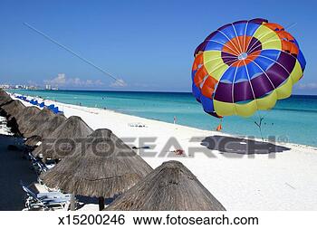 Stock Photo - beach and parasailing 
parachute, hotel 
zone, cancun, 
mexico. fotosearch 
- search stock 
photos, pictures, 
images, and photo 
clipart