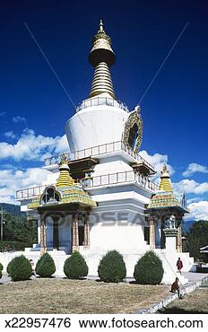 Stock Photo - bhutan, thimphu, 
monks outside 
thimphu memorial 
chorten. fotosearch 
- search stock 
photos, pictures, 
images, and photo 
clipart
