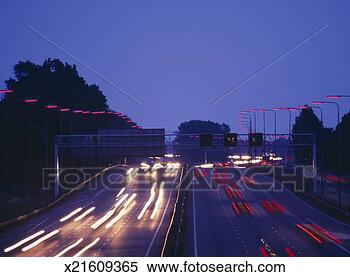 Stock Image - holland, amsterdam, 
highway (blurred 
motion), dusk. 
fotosearch - search 
stock photos, 
pictures, images, 
and photo clipart