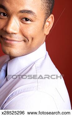 Stock Photo - mid adult man 
smiling. fotosearch 
- search stock 
photos, pictures, 
images, and photo 
clipart