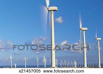 Stock Image - wind turbines 
against blue sky. 
fotosearch - search 
stock photos, 
pictures, images, 
and photo clipart