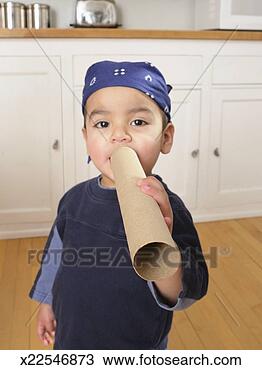 Stock Photo - boy (2-3) shouting 
through cardboard 
tube, portrait. 
fotosearch - search 
stock photos, 
pictures, images, 
and photo clipart
