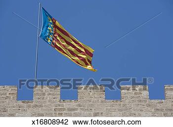 Stock Photo - flag of valencia, 
fortified wall 
and blue sky. 
fotosearch - search 
stock photos, 
pictures, images, 
and photo clipart