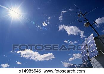 Stock Image - low angle view 
of solar panels 
and sun. fotosearch 
- search stock 
photos, pictures, 
images, and photo 
clipart
