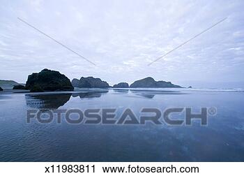 Stock Photography - rocky coastline 
at dawn. fotosearch 
- search stock 
photos, pictures, 
images, and photo 
clipart