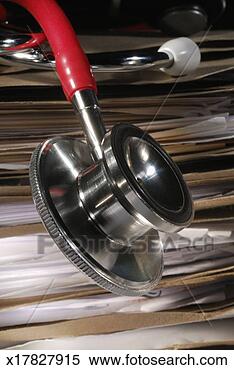 Stock Image - stethoscope and 
pile of medical 
records, close-up. 
fotosearch - search 
stock photos, 
pictures, images, 
and photo clipart
