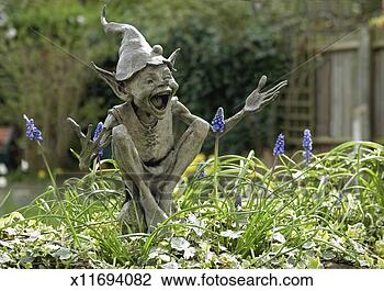 Stock Photo - uk,  england, 
 isabel's goblin 
sculpture by david 
goode in suburban. 
fotosearch - search 
stock photos, 
pictures, images, 
and photo clipart