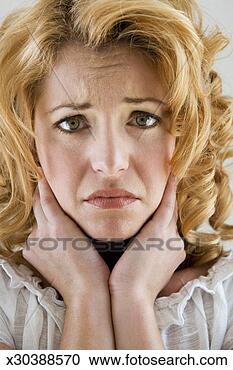 Stock Photography - young woman with 
hands around neck 
and facial expression, 
 portrait. fotosearch 
- search stock 
photos, pictures, 
images, and photo 
clipart