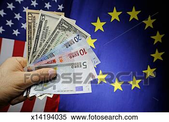 Stock Image - man's hand with 
us and euro banknotes 
on european union 
and us flag. fotosearch 
- search stock 
photos, pictures, 
images, and photo 
clipart