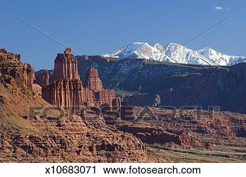 Stock Photography - usa,  utah,  professor 
valley,  la sal 
mountains behind 
fisher towers. 
fotosearch - search 
stock photos, 
pictures, images, 
and photo clipart